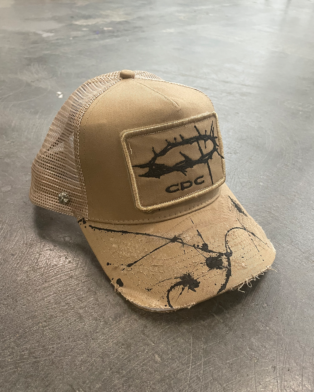 i_001 CAP CDC LOGO SAND
