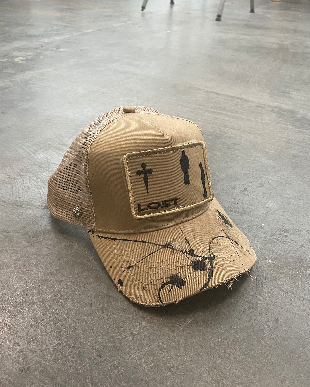 i_001 CAP LOST LOGO SAND